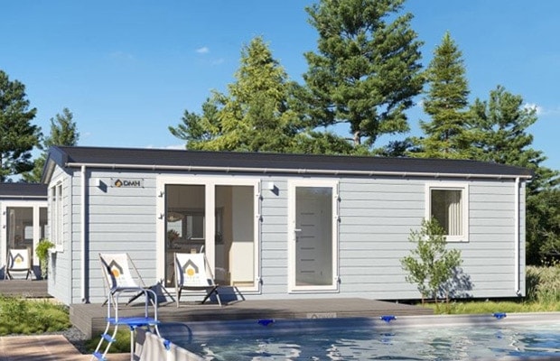 Mobilhaus C — mittelgroßes Mobilhaus mit moderner weißer Fassade am Pool